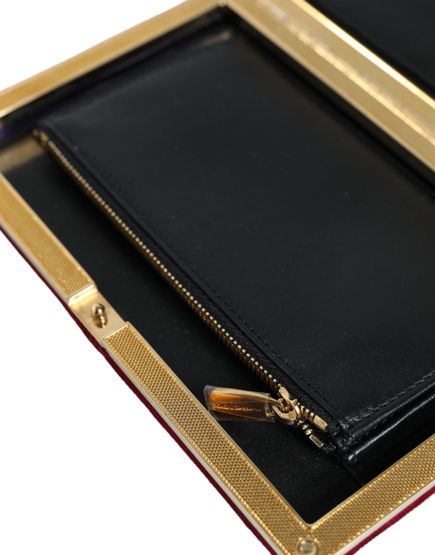Compact Evening Box Clutch Convertible Handbag by Dolce & Gabbana for women in velvet poly cotton & leather black, gold, pearl & red features a polished silhouette with a secure , ample cardholder, and polished for a sophisticated look.