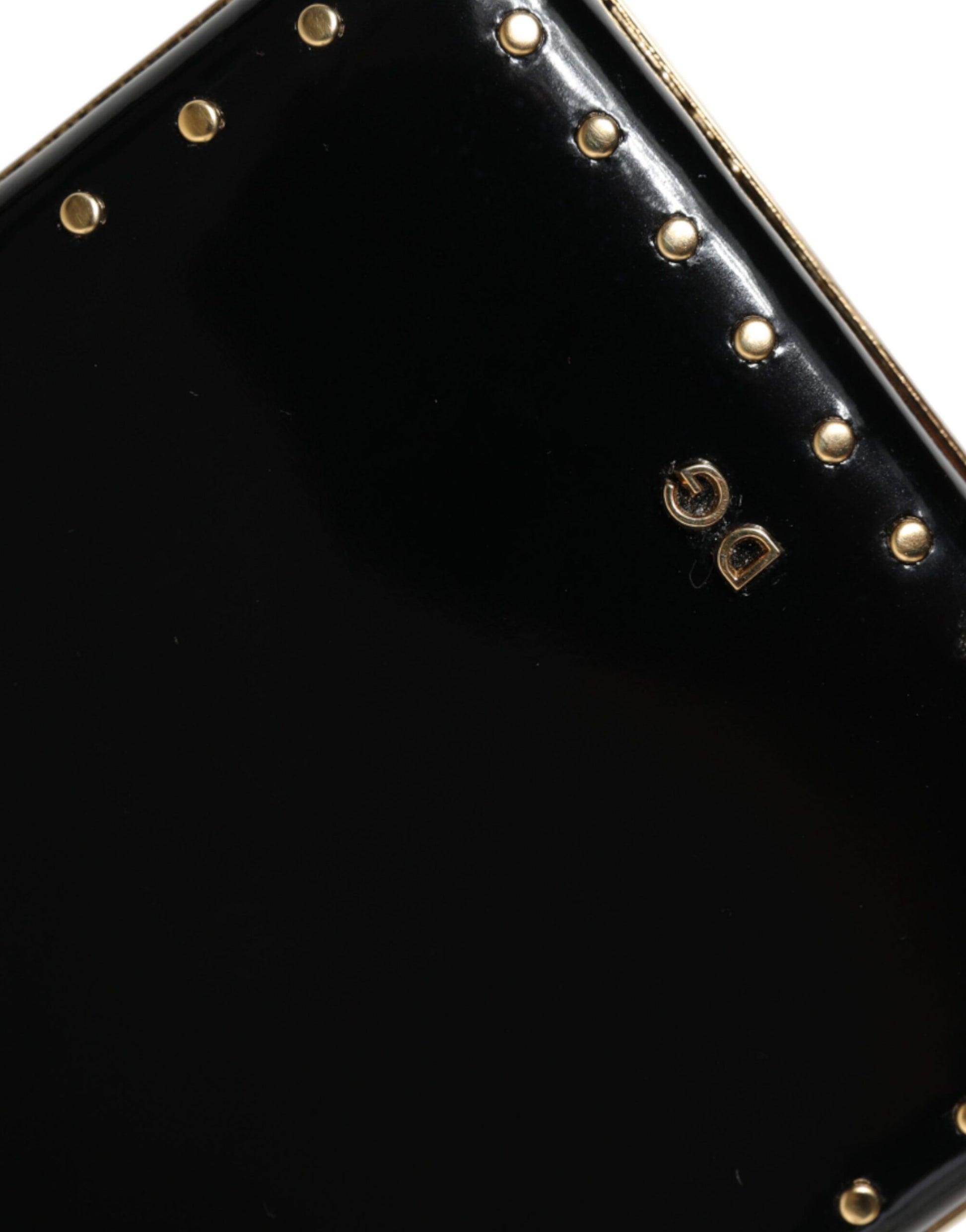 Compact Evening Box Clutch Convertible Handbag by Dolce & Gabbana for women in leather & brass black & gold presents a enviable design with a secure , ample , and versatile for a sophisticated look.
