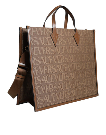 Crossbody Tote Bag by Versace for women in leather & cotton brown, white & jacquard features an jet-set Leather & Cotton Crossbody Tote Bag design with a secure zipper, ample , and versatile crossbody-strap, shoulder-strap, handle, adjustable-strap & detachable-strap for an jet-set finish.
