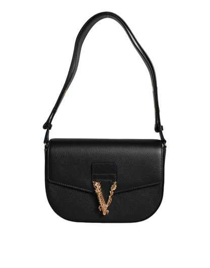Compact 2-in-1 Shoulder & Crossbody Bag by Versace for women in calf leather & cotton black features a stately silhouette, showcasing a secure magnetic, ample internal-pockets, and stately crossbody-strap, shoulder-strap, adjustable-strap & handle for a stately finish.