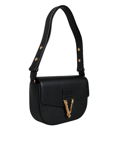 Compact 2-in-1 Shoulder & Crossbody Bag by Versace for women in calf leather & cotton black features an effortlessly chic silhouette with a secure magnetic, ample internal-pockets, and versatile crossbody-strap, shoulder-strap, adjustable-strap & handle for effortlessly chic everyday luxury.
