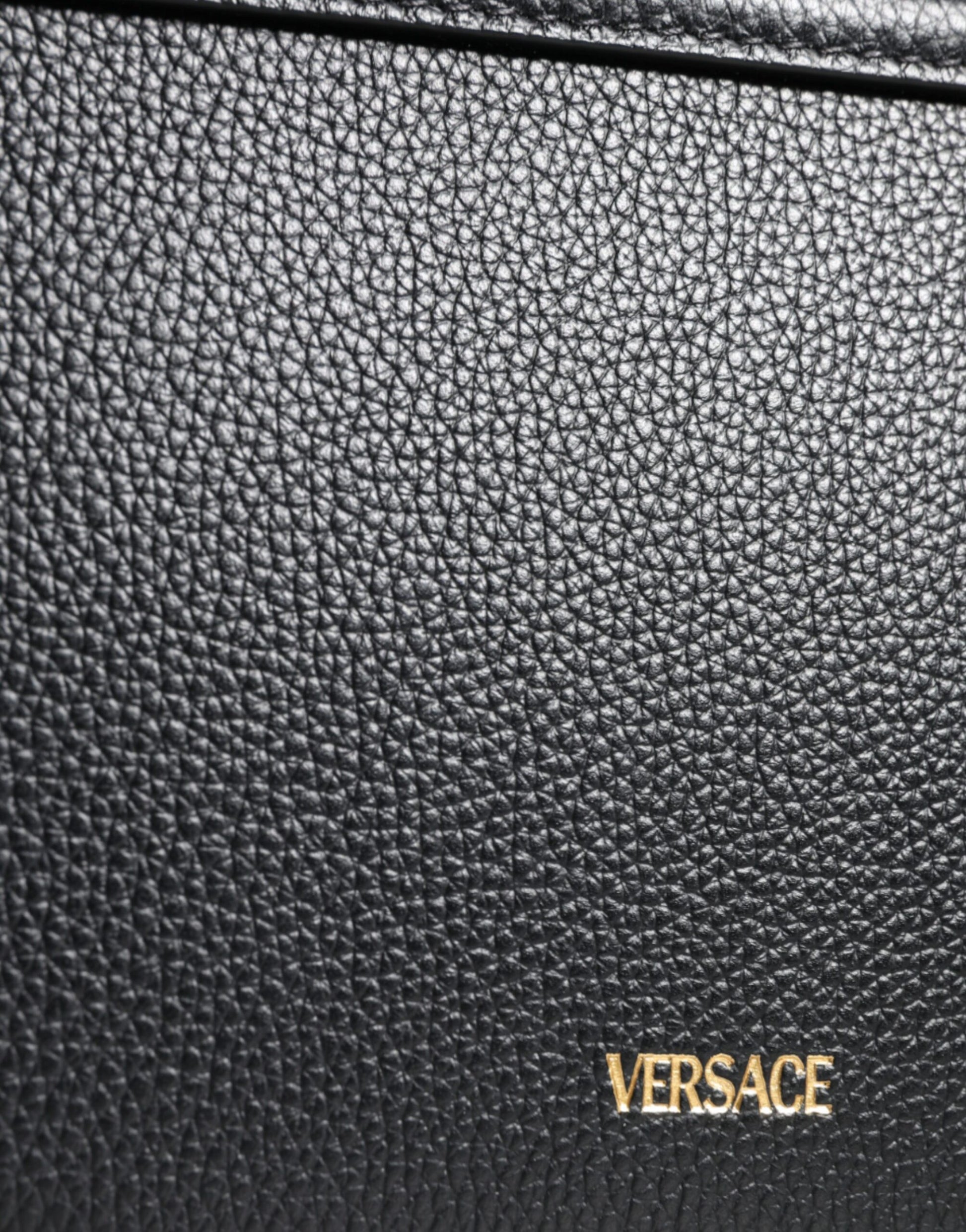 Compact 2-in-1 Shoulder & Crossbody Bag by Versace for women in calf leather & cotton black features a effortless chic silhouette with a secure magnetic, ample internal-pockets, and versatile crossbody-strap, shoulder-strap, adjustable-strap & handle for a effortless chic finish.