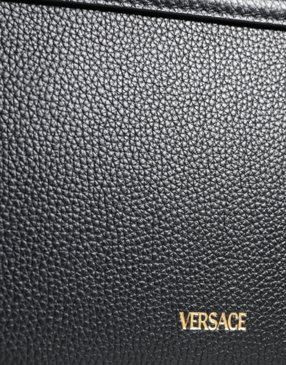 Compact 2-in-1 Shoulder & Crossbody Bag by Versace for women in calf leather & cotton black features a effortless chic silhouette with a secure magnetic, ample internal-pockets, and versatile crossbody-strap, shoulder-strap, adjustable-strap & handle for a effortless chic finish.