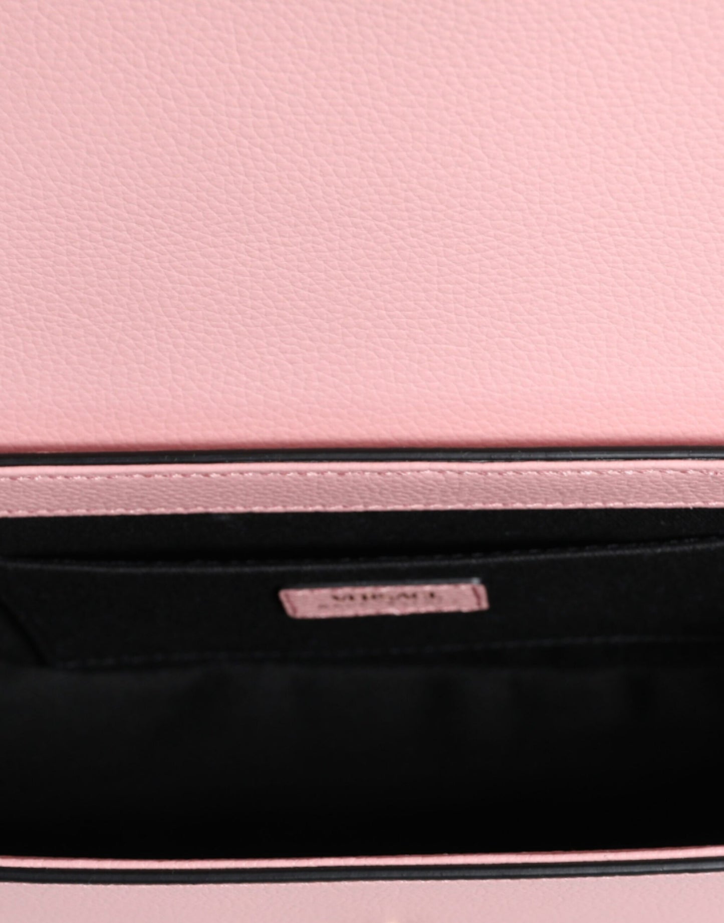 Compact 2-in-1 Shoulder & Crossbody Bag by Versace for women in calf leather viscose & cotton black & pink features a effortless sophistication silhouette, secured by a magnetic with ample internal-pockets and versatile crossbody-strap, shoulder-strap, adjustable-strap & handle for a effortless sophistication finish.