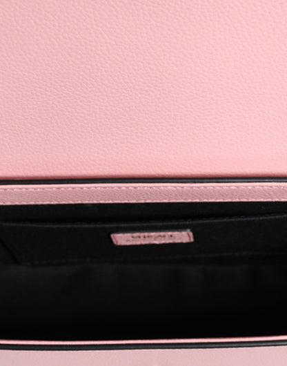 Compact 2-in-1 Shoulder & Crossbody Bag by Versace for women in calf leather viscose & cotton black & pink features a effortless sophistication silhouette, secured by a magnetic with ample internal-pockets and versatile crossbody-strap, shoulder-strap, adjustable-strap & handle for a effortless sophistication finish.
