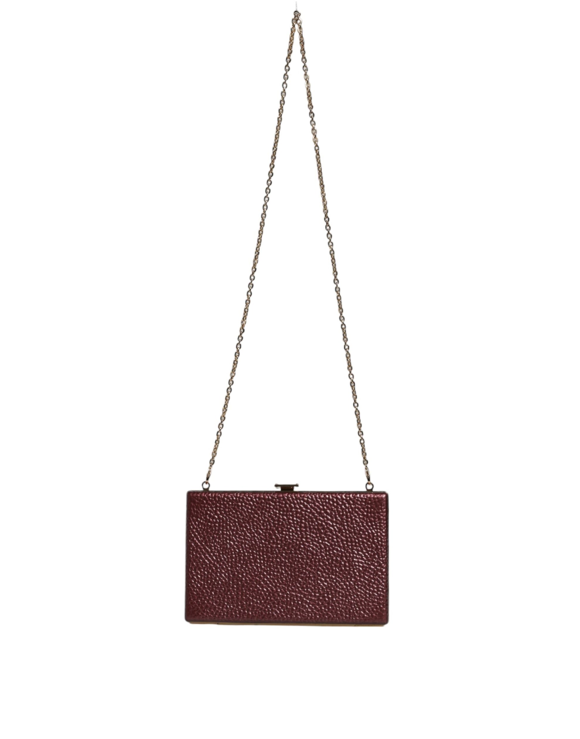 Compact Evening Crossbody Box Clutch Convertible Handbag by Dolce & Gabbana for women in leather & brass black, gold & maroon features a exquisite silhouette with a secure , ample cardholder, and versatile crossbody-strap for a exquisite look.
