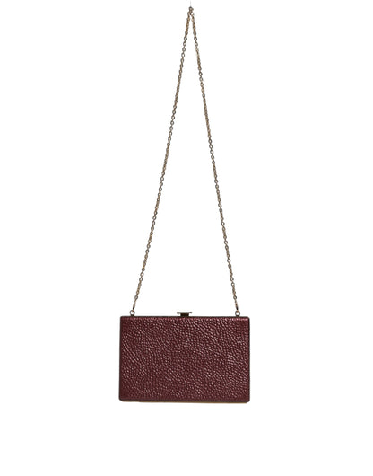 Compact Evening Crossbody Box Clutch Convertible Handbag by Dolce & Gabbana for women in leather & brass black, gold & maroon features a exquisite silhouette with a secure , ample cardholder, and versatile crossbody-strap for a exquisite look.