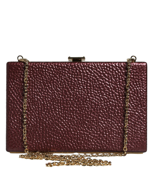 Compact Evening Crossbody Box Clutch Convertible Handbag by Dolce & Gabbana for women in leather & brass black, gold & maroon presents a enviable design with a secure , ample cardholder, and versatile crossbody-strap for a sophisticated look.