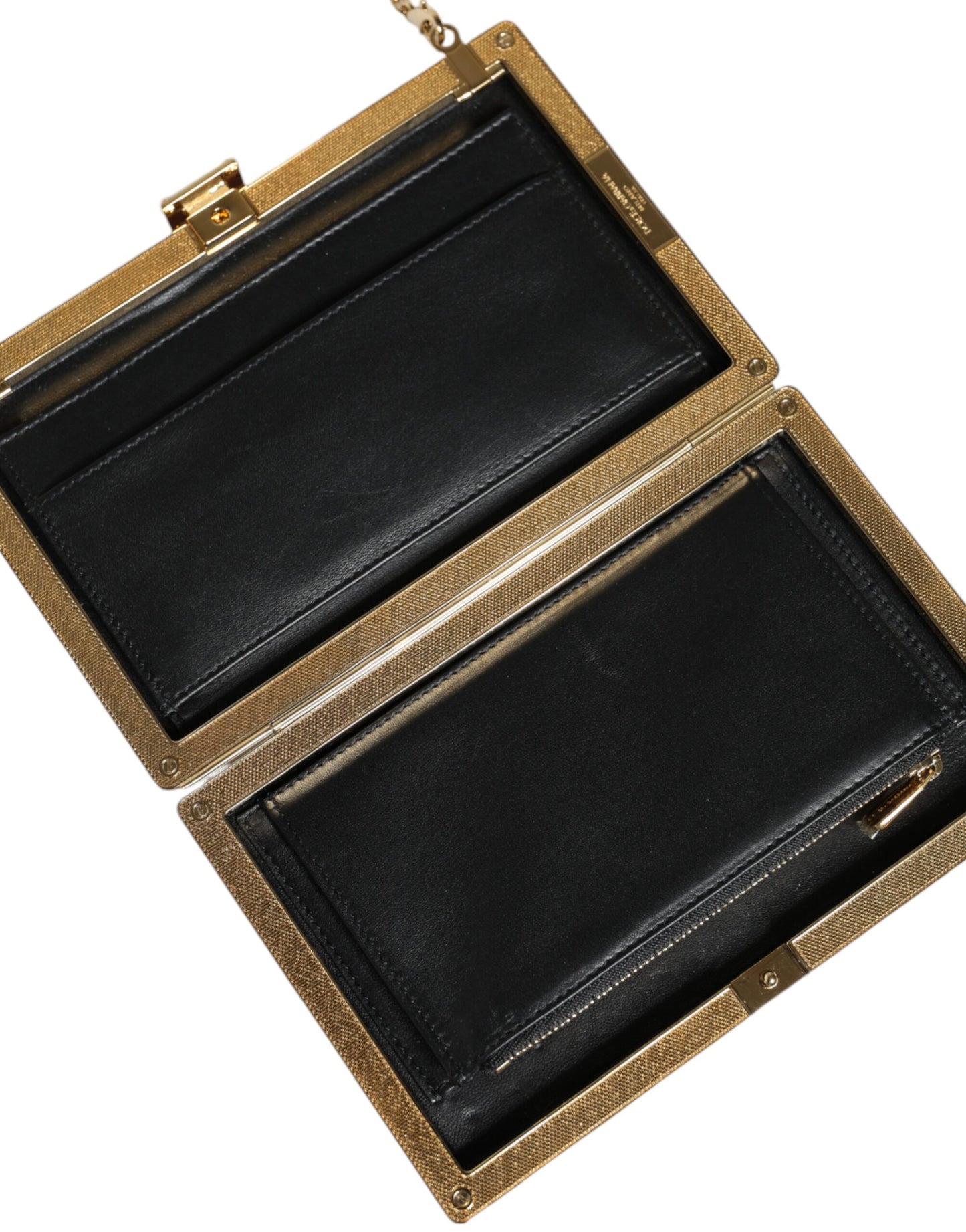 Compact Evening Crossbody Box Clutch Convertible Handbag by Dolce & Gabbana for women in leather & brass black, gold & maroon presents a exquisite silhouette, showcasing a secure and organized cardholder with versatile crossbody-strap.