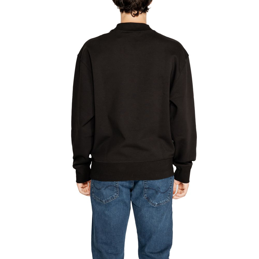 This Sweater by Calvin Klein Jeans for men in stretch polyester cotton black presents a understated silhouette, featuring a sophisticated and for a understated finish.