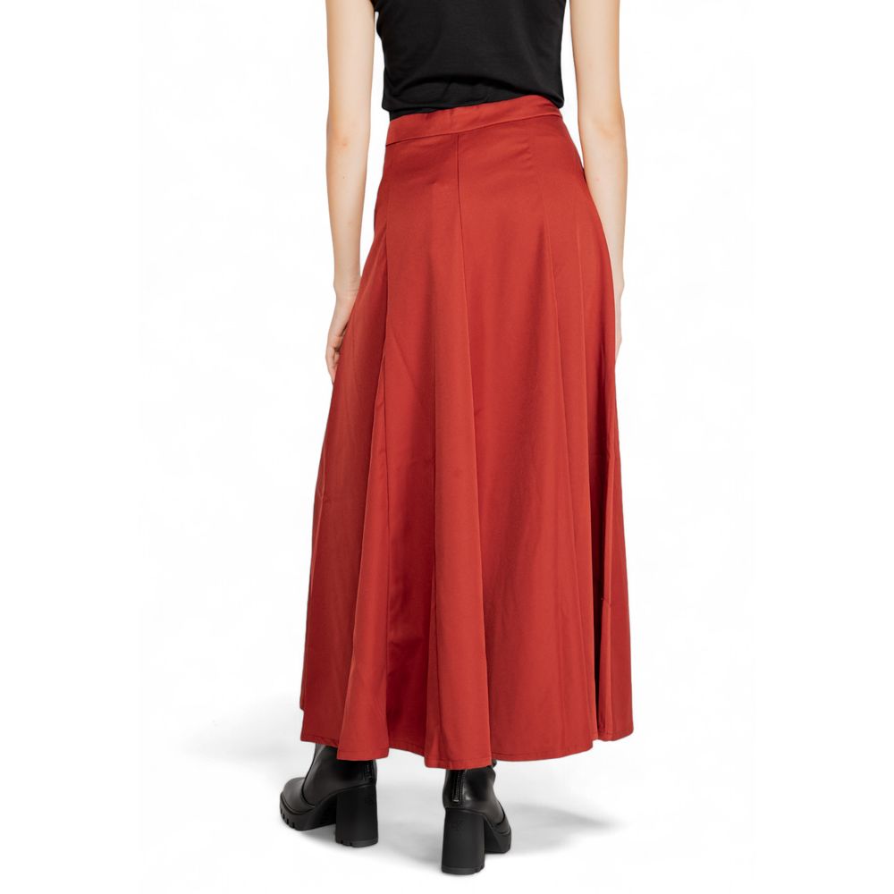 Skirt by Vero Moda for women in polyester red showcases a sultry silhouette, elegantly defined by its and the sophisticated sultry design of the Women's Polyester Skirt.