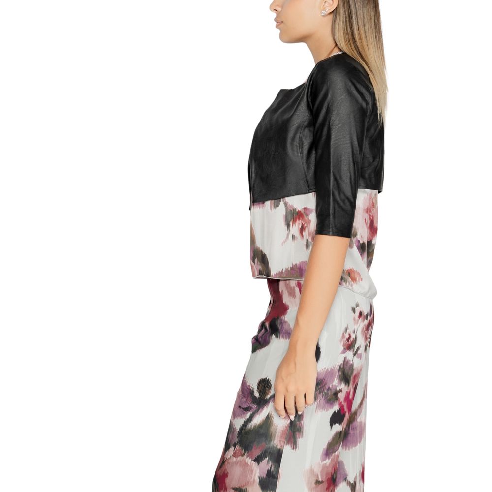 Cardigan by Rinascimento for women in polethylene polyurethane leather black features an impeccable silhouette, showcasing a sophisticated and detail for a truly impeccable finish.