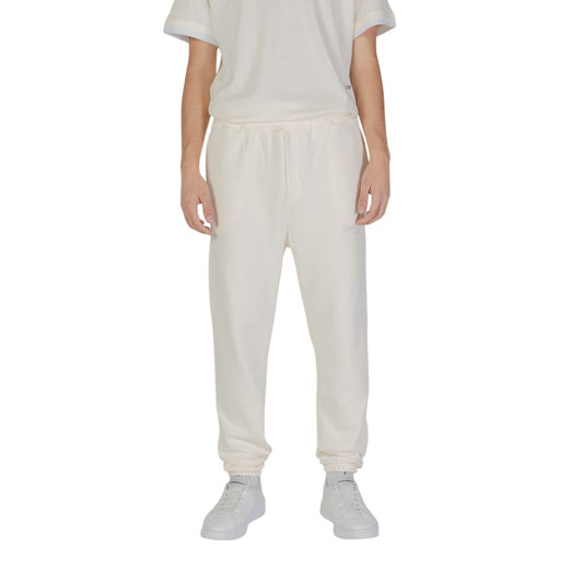 Pants by Underclub for men in cotton cream features an understated silhouette, showcasing a sophisticated and long with a refined for an understated, polished aesthetic.