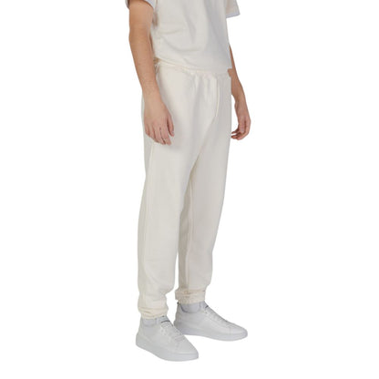 Pants by Underclub for men in cotton cream features an on trend silhouette with a and cut in an elegant long for a sophisticated look.
