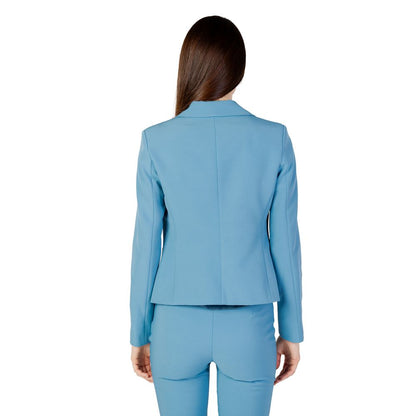 Suit by Rinascimento for women in polyester & brass turquoise showcases a sleek silhouette, complete with a sophisticated v-neck lapel notch-lapel neckline and a sleek designed for an impeccable sartorial finish.