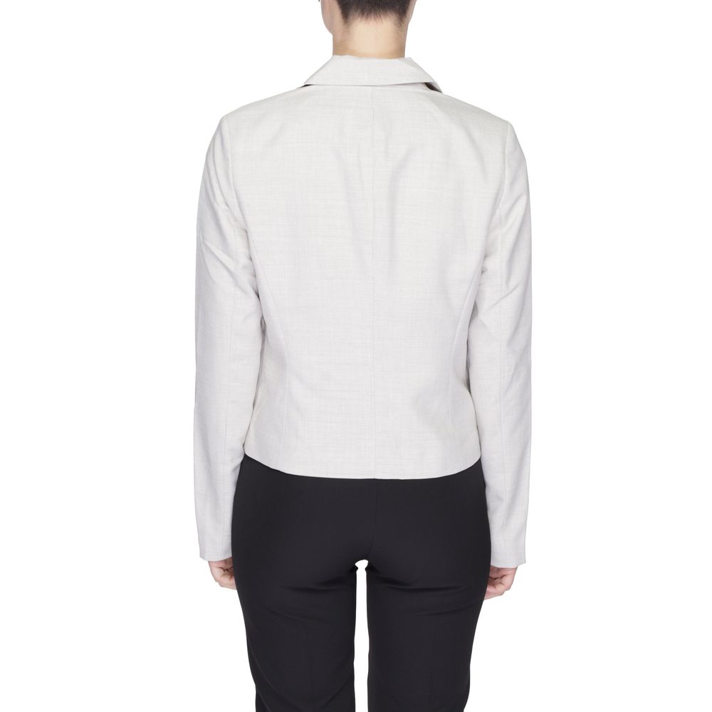 Suit by Vero Moda for women in polyester gray showcases a sartorial silhouette, artfully finished with a sophisticated v-neck lapel notch-lapel neckline and a sartorial for a truly sartorial look.