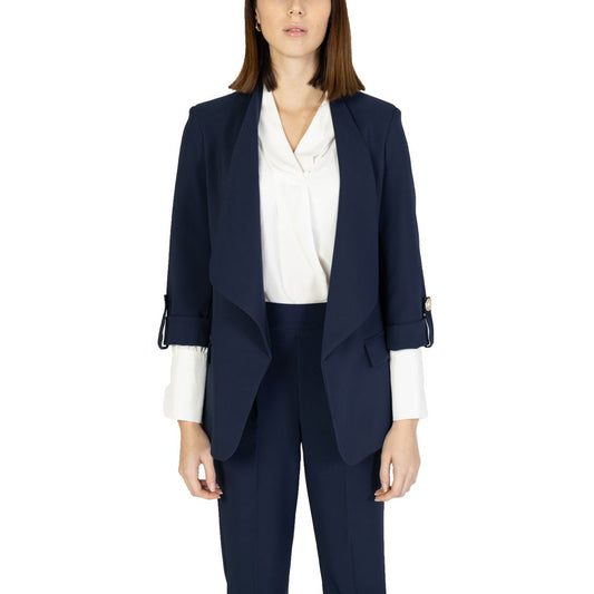 Suit by Rinascimento for women in polyester blue showcases a sartorial silhouette, artfully finished with a sophisticated lapel neckline and a sartorial for a truly sartorial look.