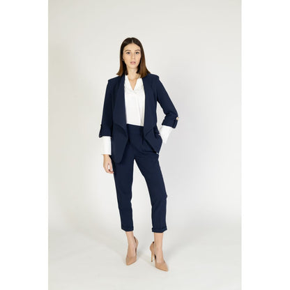 Suit by Rinascimento for women in polyester blue showcases a tailored silhouette, artfully defined by its and tailored .