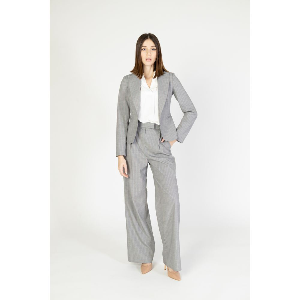 Pants by Rinascimento for women in stretch viscose polyester multicolor features a stylish silhouette with a stylish wide, long, and .