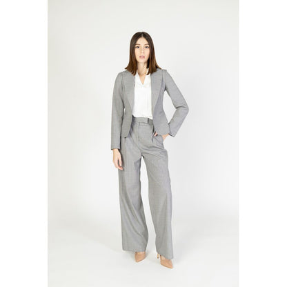 Pants by Rinascimento for women in stretch viscose polyester multicolor features a stylish silhouette with a stylish wide, long, and .