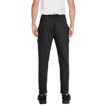 Activewear Jogger Pants by Calvin Klein for men in stretch polyester & viscose black features an sporty tapered-leg with a and long, showcasing sporty .