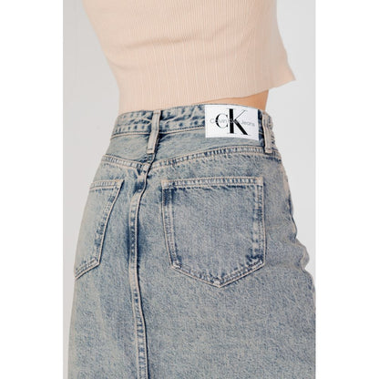 Skirt by Calvin Klein Jeans for women in cotton blue showcases a dramatic silhouette, artfully capturing the essence of the Women's Cotton Skirt in a dramatic cut for a refined look.