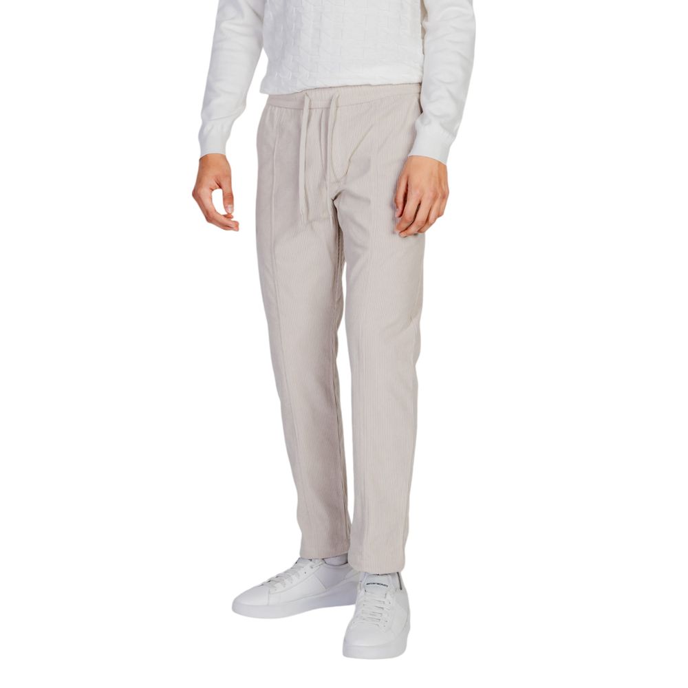 Pants by Antony Morato for men in polyester beige showcases a unrivaled comfort silhouette, featuring a cut and long with a for a unrivaled comfort and refined aesthetic.