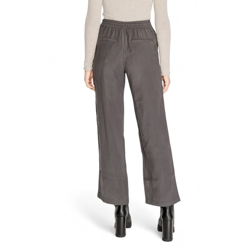 Pants by Jacqueline De Yong for women in polyester & viscose gray features a enduring silhouette, showcasing a enduring and long with a for a premium, tailored aesthetic.