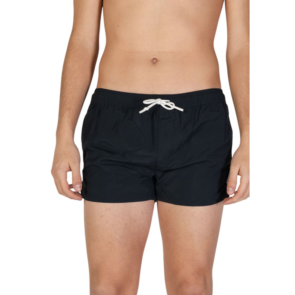 Swimwear by Hamaki-Ho for men in polyester black presents a magnificent silhouette, artfully capturing the essence of the Men's Polyester Swimwear with its magnificent cut and sophisticated design.