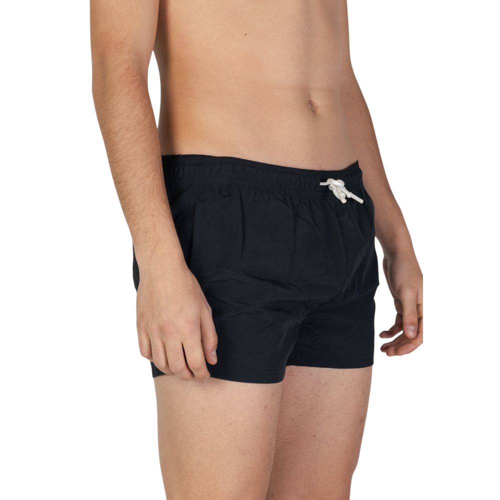 Swimwear by Hamaki-Ho for men in polyester black features an luxurious silhouette, showcasing the luxurious design of this Men's Polyester Swimwear for a sophisticated vacation look.
