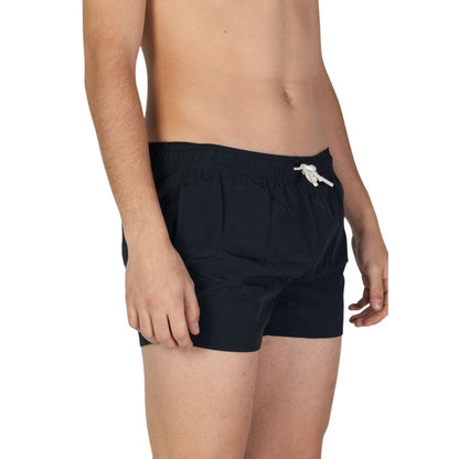 Swimwear by Hamaki-Ho for men in polyester black features an luxurious silhouette, showcasing the luxurious design of this Men's Polyester Swimwear for a sophisticated vacation look.
