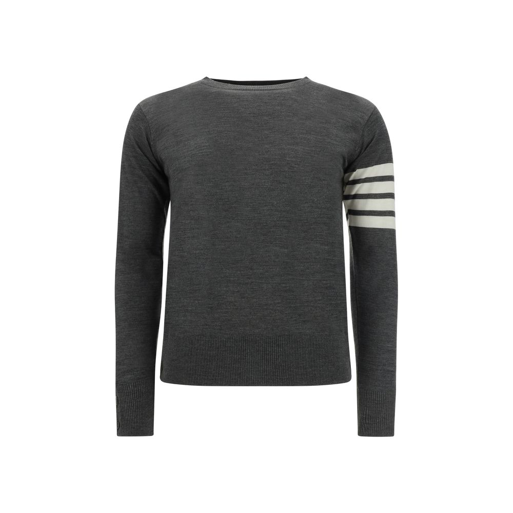 This Sweater by Thom Browne for men in wool gray, patterned & striped presents a understated silhouette, featuring a sophisticated crew neckline and for a understated finish.