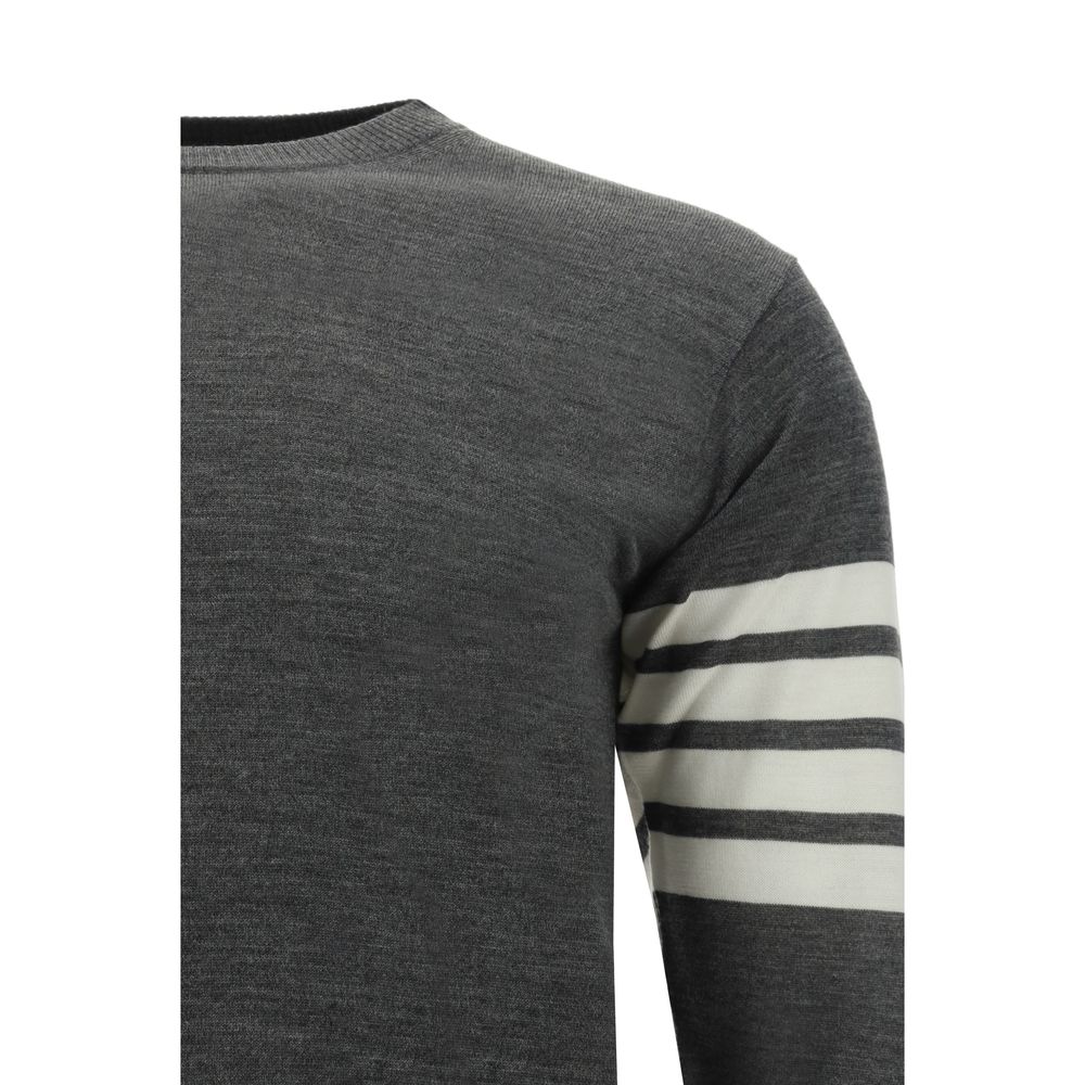 This Sweater by Thom Browne for men in wool gray, patterned & striped presents a understated silhouette, featuring a sophisticated crew neckline and for a understated finish.