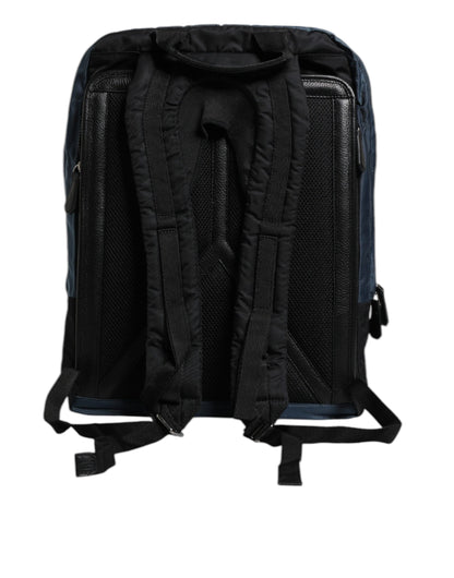 Backpack by Dolce & Gabbana for men in poly cotton & leather black, blue, leopard-print & print showcases an architectural Poly Cotton Leather Backpack design, featuring a secure zipper, ample , and architectural backpack-strap for a sophisticated look.