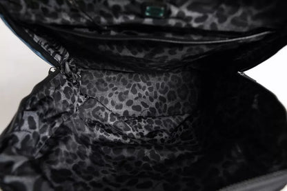 Backpack by Dolce & Gabbana for men in poly cotton & leather black, blue, leopard-print & print showcases a stately Poly Cotton Leather Backpack design, featuring a secure zipper with stately and versatile backpack-strap.