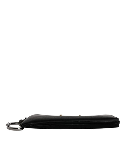 Pouch Clutch Handbag by Dolce & Gabbana for men in calfskin leather & nylon black, gold & silver features a architectural silhouette, showcasing a secure zipper, ample , and versatile for a architectural finish.