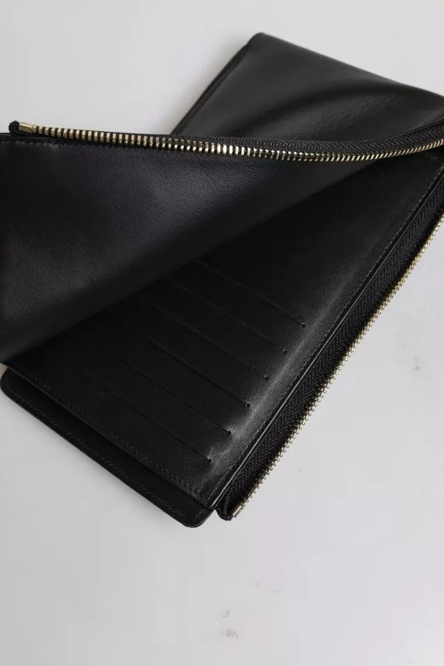 Cardholder Wallet by Dolce & Gabbana for women in leather black showcases a refined silhouette, artfully detailed with the signature style of the Leather Cardholder Wallet and functional card-organization coin-purse.