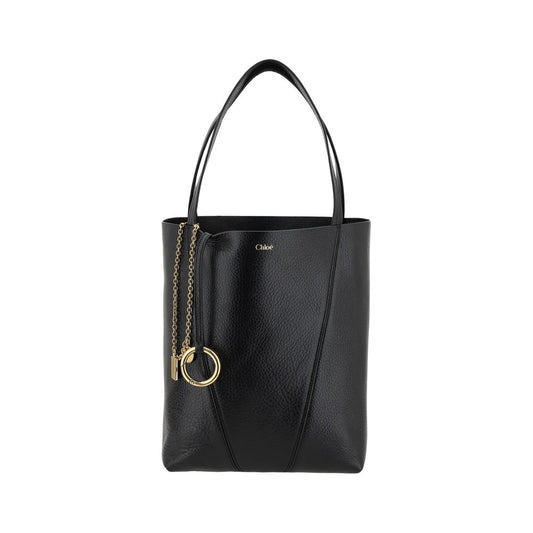 Shoulder Bag by Chloé for women in grained leather black & monogram showcases a enviable silhouette, artfully detailed with a secure , organized single-compartment, and versatile shoulder-strap & handle for a enviable look.