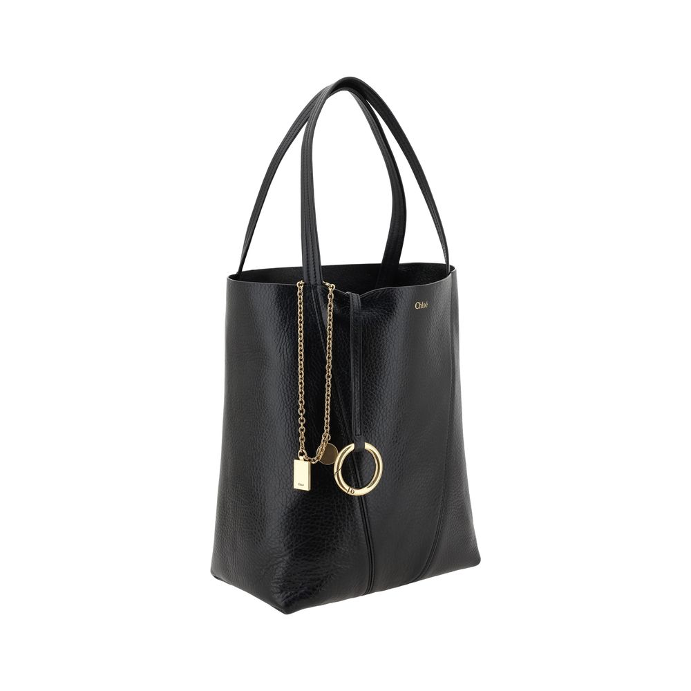 Shoulder Bag by Chloé for women in grained leather black & monogram features a effortless chic silhouette with a secure , ample single-compartment, and versatile shoulder-strap & handle for a effortless chic finish.