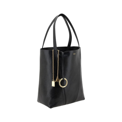 Shoulder Bag by Chloé for women in grained leather black & monogram features a effortless chic silhouette with a secure , ample single-compartment, and versatile shoulder-strap & handle for a effortless chic finish.
