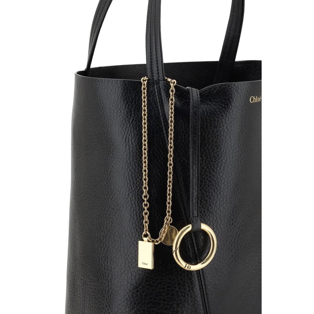 Shoulder Bag by Chloé for women in grained leather black & monogram features a distinguished silhouette, showcasing a secure and distinguished single-compartment with versatile shoulder-strap & handle for a distinguished finish.