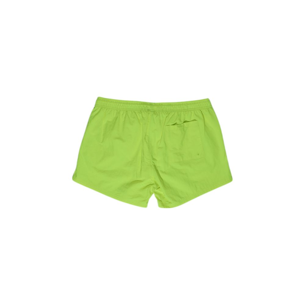 Swimwear by Hamaki-Ho for men in polyester yellow showcases a contemporary silhouette, artfully capturing the contemporary essence of the Men's Polyester Swimwear design for a sophisticated resort look.