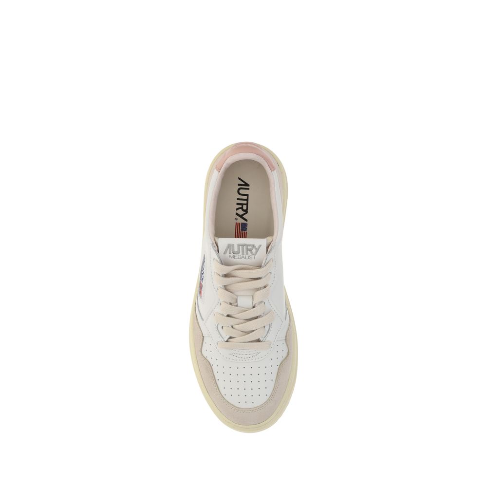 Sneakers by Autry for women in bos taurus calfskin leather & nylon white features an opulent silhouette from the Women's Low Top Bos Taurus Calfskin Leather & Nylon Sneakers collection, showcasing a signature low-top style with an opulent finish.