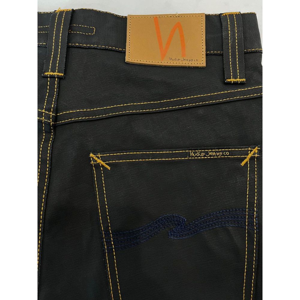 Jeans by Nudie Jeans for men in denim cotton black presents a tailored silhouette, showcasing a tailored and long cut with a refined for a truly tailored aesthetic.