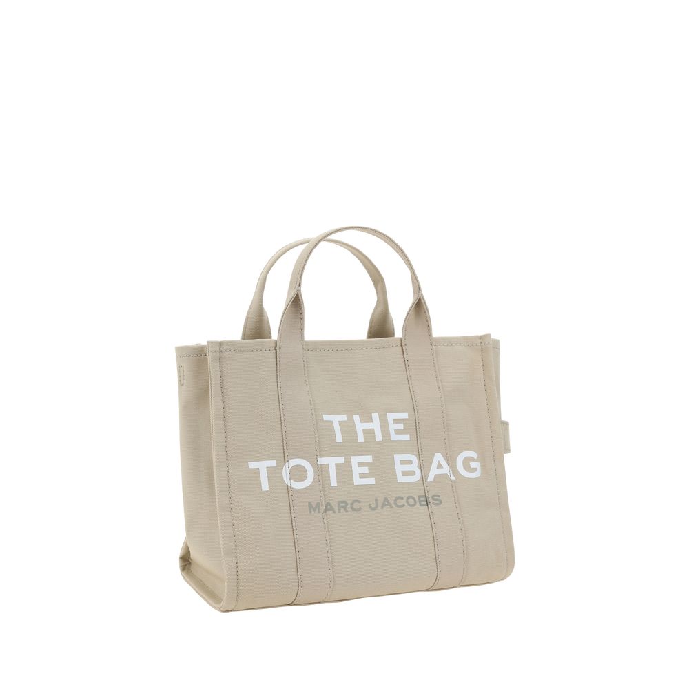 Medium Tote Handbag by Marc Jacobs for women in cotton beige, signature, monogram & print features a contemporary silhouette, showcasing a secure zipper, ample , and contemporary shoulder-strap, handle & adjustable-strap for a sophisticated look.