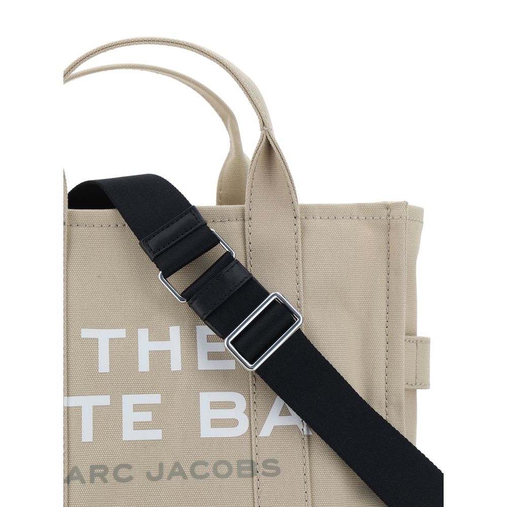 Medium Tote Handbag by Marc Jacobs for women in cotton beige, signature, monogram & print presents a ornamental silhouette, showcasing a secure zipper, ample , and versatile shoulder-strap, handle & adjustable-strap for a ornamental finish.