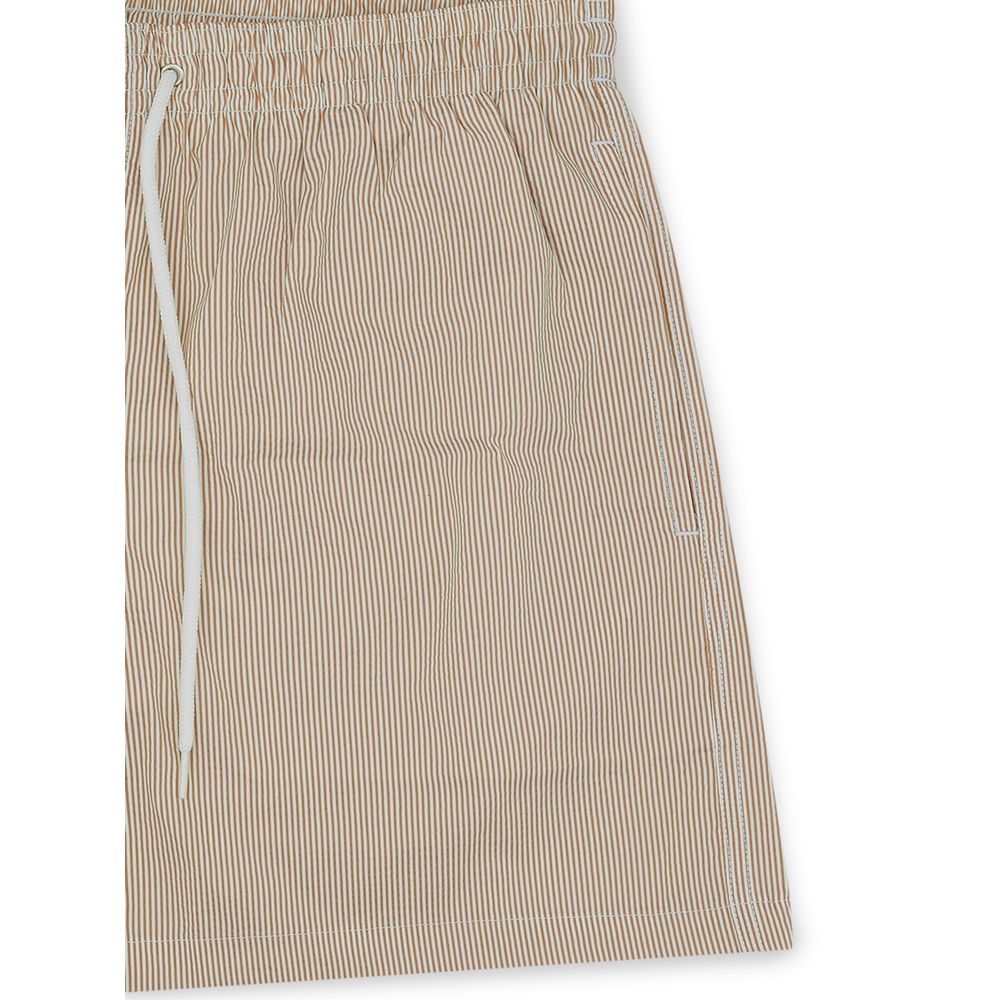 Boardshorts by Malo for men in polyester and beige showcases a magnificent silhouette as Waves Men's Polyester Boardshorts.