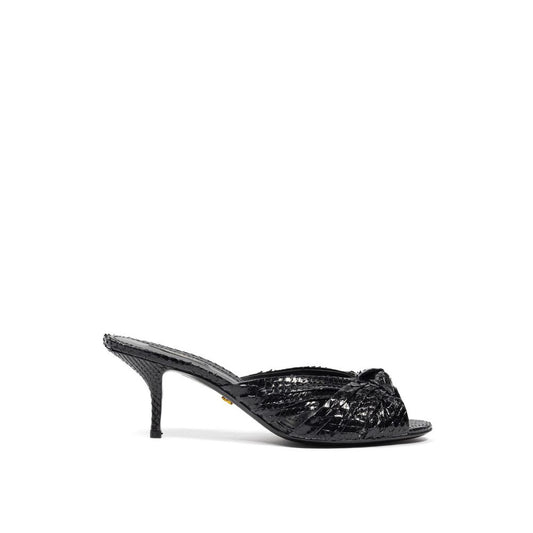 Sandals by Dolce & Gabbana for women in leather and black presents a captivating silhouette, showcasing the signature style of the Women's Leather Sandals with a captivating and captivating .