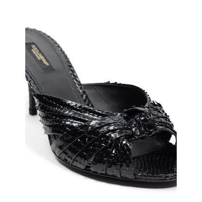 Sandals by Dolce & Gabbana for women in leather black features an architectural design from the Women's Leather Sandals collection, defined by a architectural and for a architectural finish.