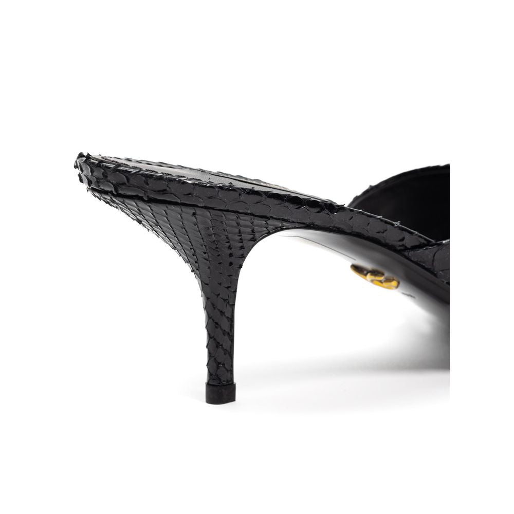 Sandals by Dolce & Gabbana for women in leather and black presents a captivating silhouette, showcasing the signature style of the Women's Leather Sandals with a captivating and captivating .
